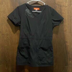 X small black scrub top V-neck front pockets cinched back and paisley detail